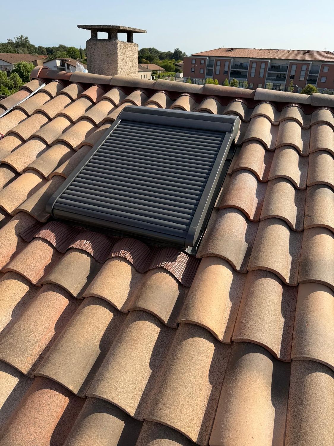 Fenêtre de toit Velux avec volet roulant